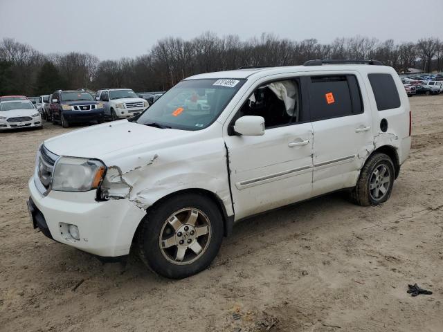 HONDA PILOT TOUR 2011 with VIN 5FNYF4H92BB103310 - Photo from auction