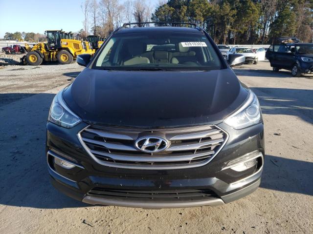 Photo 5 from auction – 2017 HYUNDAI SANTA FE S with VIN 5NMZU3LB6HH036829