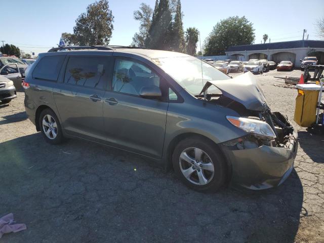 Photo 4 from auction – 2014 TOYOTA SIENNA LE with VIN 5TDKK3DC0ES463379