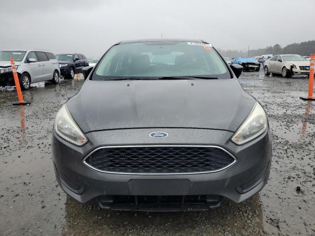 Снимка 5 от търг – 2016 FORD FOCUS SE с VIN 1FADP3K20GL389606