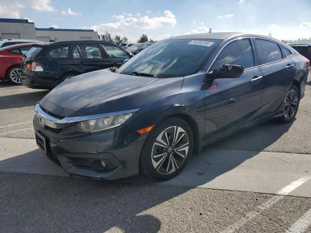 HONDA CIVIC EX 2017 with VIN 2HGFC1F37HH636562 - Photo from auction