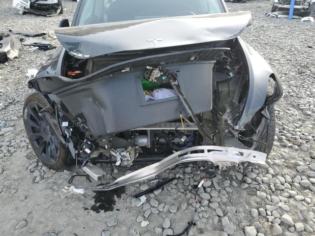 Photo 11 from auction – 2023 TESLA MODEL Y with VIN 7SAYGDEE8PA094313