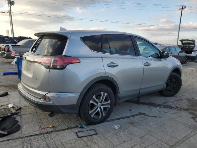 Photo 3 from auction – 2018 TOYOTA RAV4 LE with VIN 2T3ZFREV8JW476475