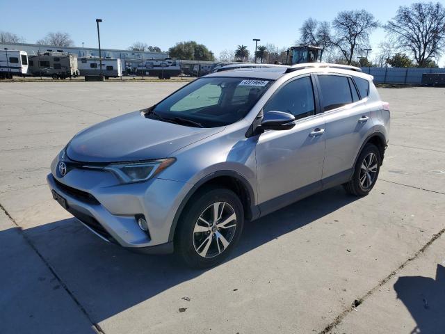 TOYOTA RAV4 XLE 2016 with VIN 2T3WFREV5GW280277 - Photo from auction