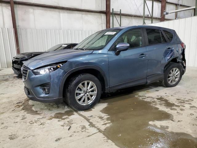 MAZDA CX-5 TOURI 2016 with VIN JM3KE2CY5G0885434 - Photo from auction