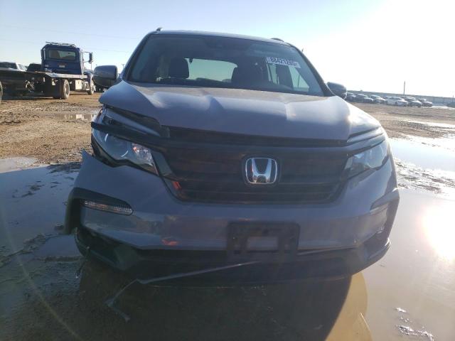 Photo 5 from auction – 2022 HONDA PILOT SE with VIN 5FNYF6H20NB045491