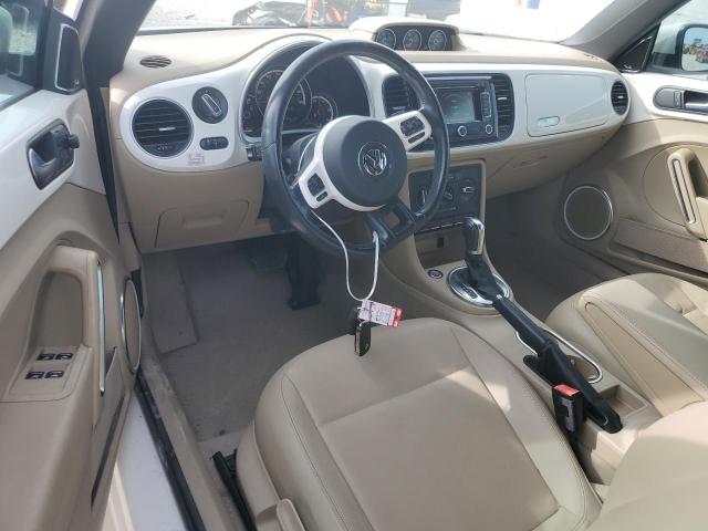 Photo 8 from auction – 2014 VOLKSWAGEN BEETLE with VIN 3VW5L7AT4EM806682