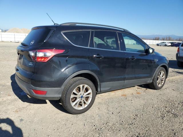 Photo 3 from auction – 2017 FORD ESCAPE SE with VIN 1FMCU9GD6HUB67090