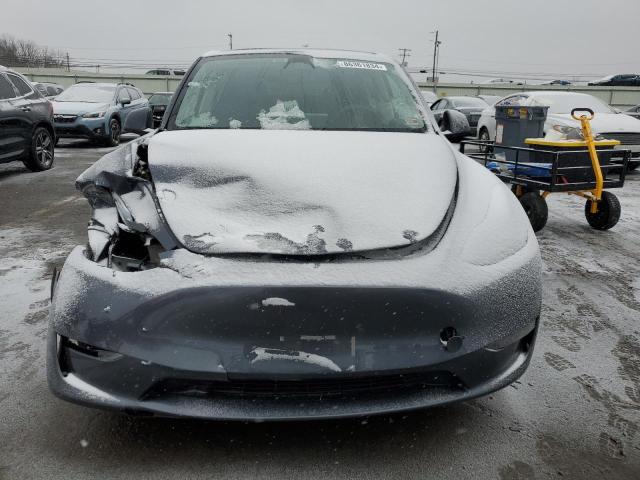Photo 5 from auction – 2023 TESLA MODEL Y with VIN 7SAYGAEE4PF597693
