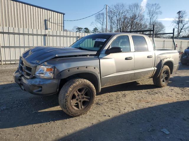 DODGE DAKOTA SLT 2011 with VIN 1D7RE3GK7BS580877 - Photo from auction