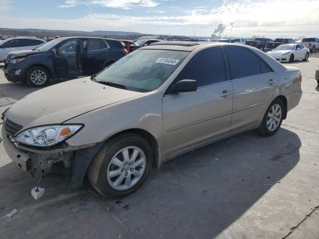 TOYOTA CAMRY LE 2002 with VIN JTDBE32K520119496 - Photo from auction