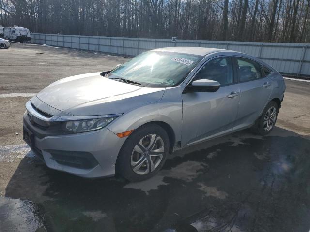 HONDA CIVIC LX 2017 with VIN 19XFC2F59HE208669 - Photo from auction