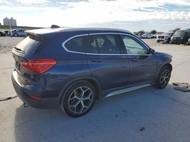 Photo 3 from auction – 2016 BMW X1 XDRIVE2 with VIN WBXHT3C3XG5E54891