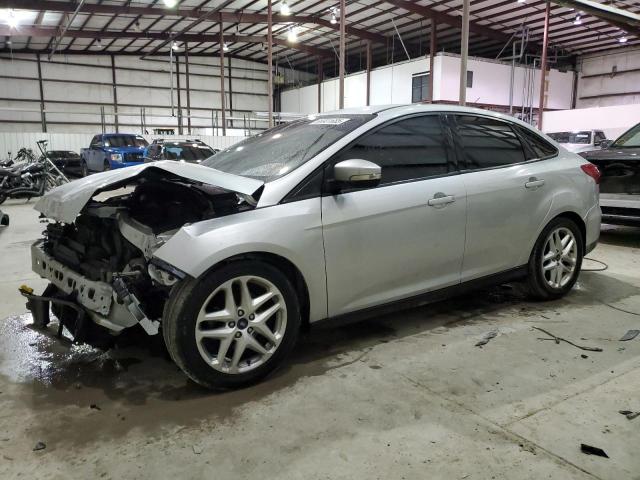 FORD FOCUS SE 2016 with VIN 1FADP3F23GL394325 - Photo from auction