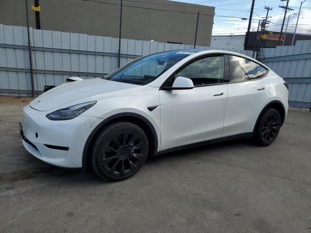 TESLA MODEL Y 2023 with VIN 7SAYGDEE8PA026562 - Photo from auction
