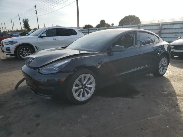 TESLA MODEL 3 2023 with VIN 5YJ3E1EA1PF595569 - Photo from auction