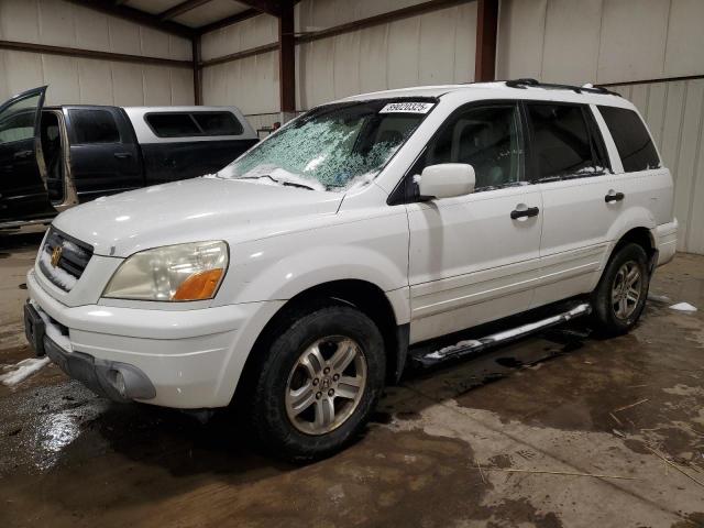 HONDA PILOT EXL 2004 with VIN 2HKYF18654H581097 - Photo from auction