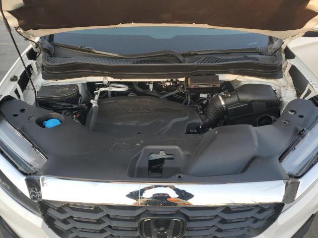Photo 12 from auction – 2024 HONDA PASSPORT E with VIN 5FNYF8H50RB003754
