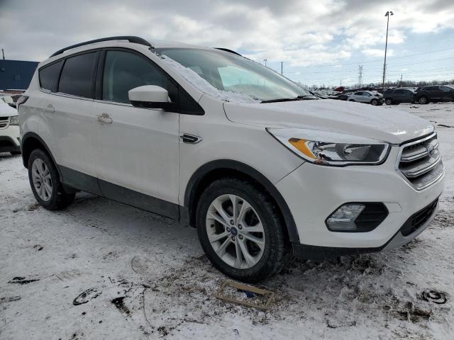 Photo 4 from auction – 2018 FORD ESCAPE SE with VIN 1FMCU9GD9JUB41332