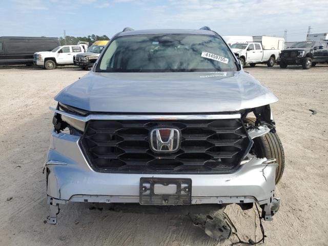 Photo 5 from auction – 2023 HONDA PILOT TOUR with VIN 5FNYG2H73PB000923