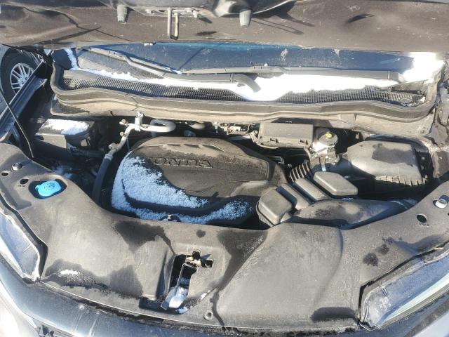 Photo 11 from auction – 2021 HONDA PASSPORT E with VIN 5FNYF8H05MB022555