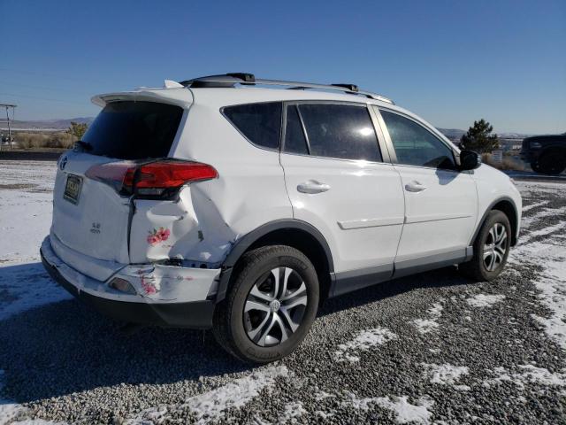 Photo 3 from auction – 2018 TOYOTA RAV4 LE with VIN 2T3BFREV3JW764213