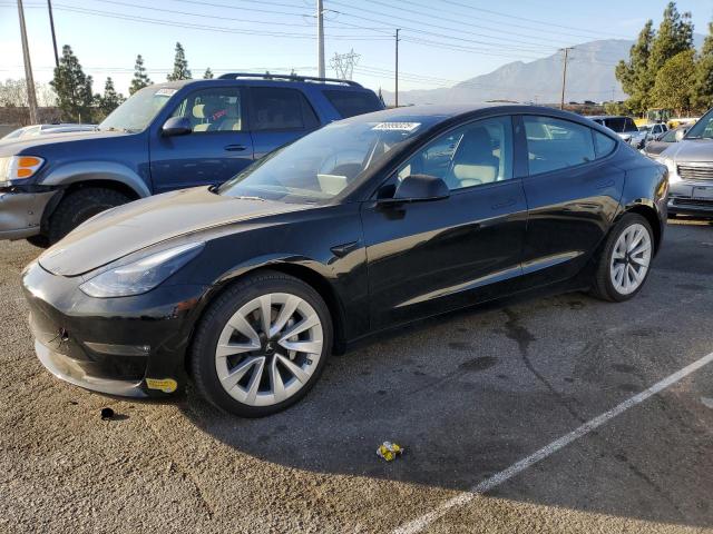 TESLA MODEL 3 2022 with VIN 5YJ3E1EB9NF131421 - Photo from auction