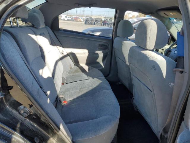 Photo 10 from auction – 2004 KIA OPTIMA LX with VIN KNAGD126545357660