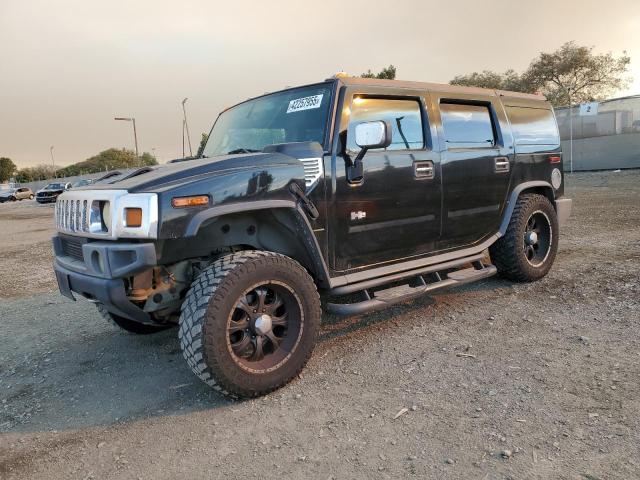 HUMMER H2 2004 with VIN 5GRGN23U84H100850 - Photo from auction