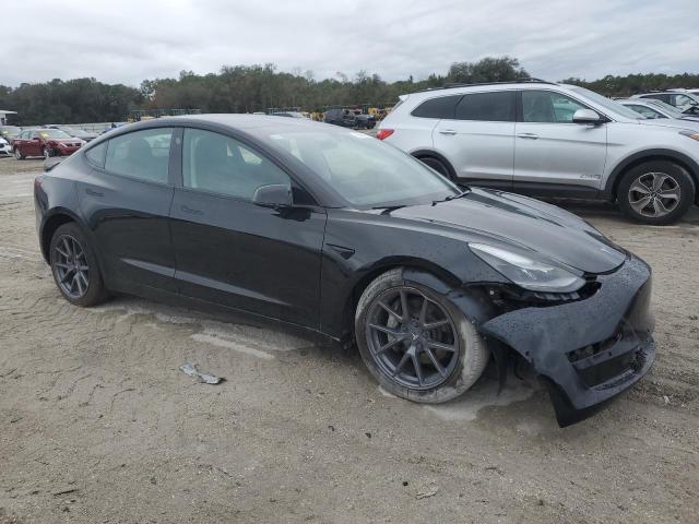 Photo 4 from auction – 2021 TESLA MODEL 3 with VIN 5YJ3E1EBXMF049521