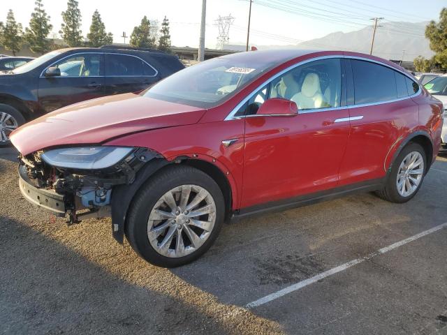TESLA MODEL X 2017 with VIN 5YJXCBE28HF048483 - Photo from auction