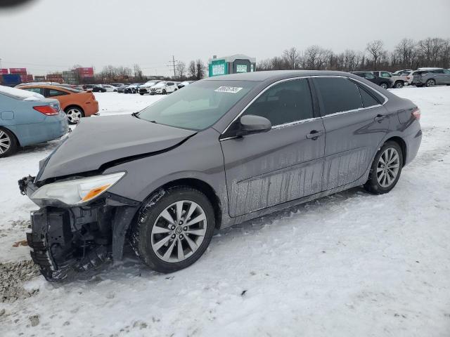 TOYOTA CAMRY LE 2017 with VIN 4T1BF1FK7HU685927 - Photo from auction