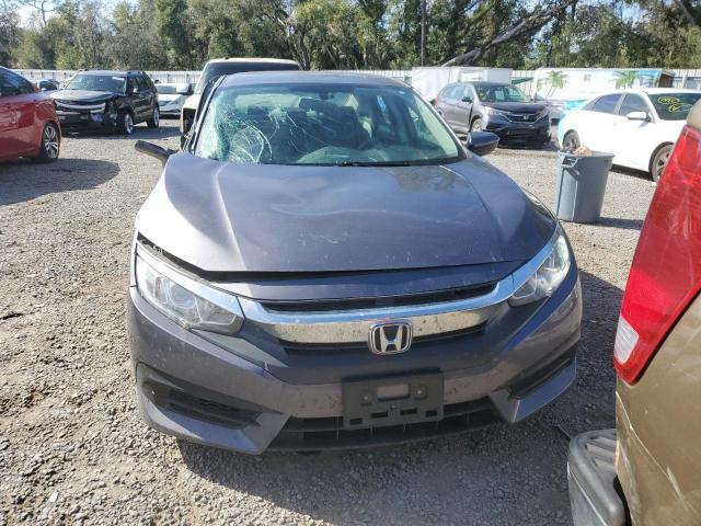 Photo 5 from auction – 2018 HONDA CIVIC LX with VIN 19XFC2F53JE008618