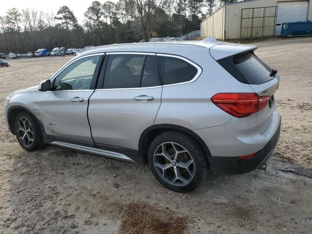 Photo 2 from auction – 2017 BMW X1 XDRIVE2 with VIN WBXHT3C39H5F85800