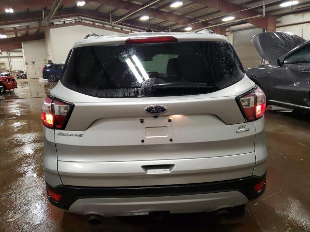 Photo 6 from auction – 2017 FORD ESCAPE SE with VIN 1FMCU9G92HUD46352