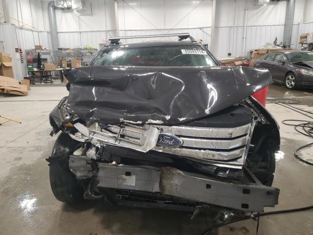 Photo 5 from auction – 2008 FORD TAURUS X S with VIN 1FMDK02W58GA29912