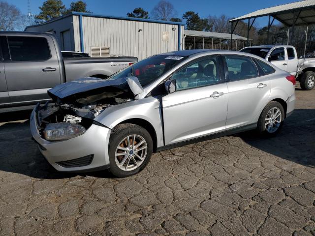 FORD FOCUS SE 2018 with VIN 1FADP3F2XJL242114 - Photo from auction
