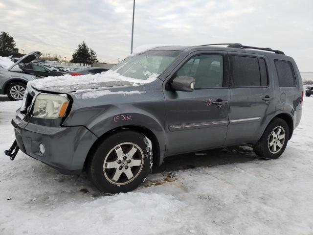 HONDA PILOT TOUR 2010 with VIN 5FNYF4H88AB005078 - Photo from auction