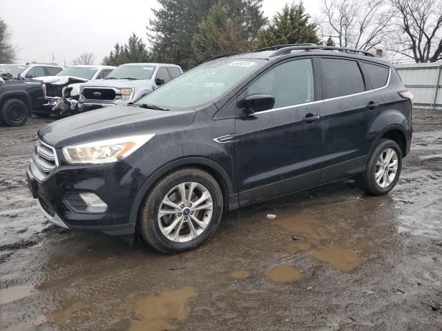 FORD ESCAPE SE 2017 with VIN 1FMCU9GD9HUC41666 - Photo from auction