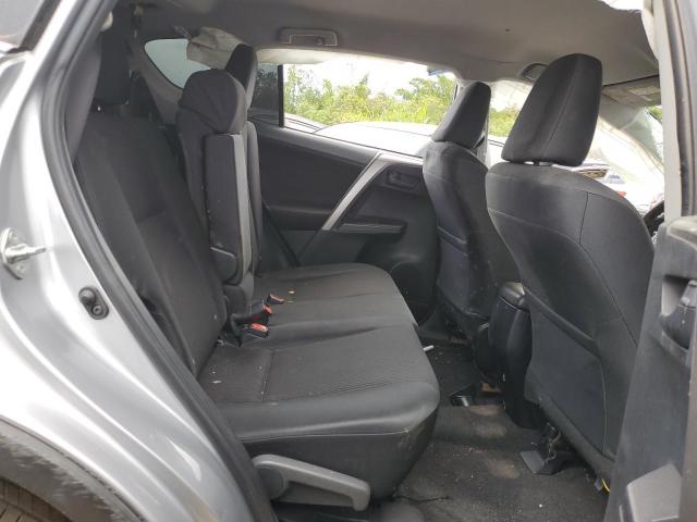 Photo 11 from auction – 2018 TOYOTA RAV4 LE with VIN JTMZFREV3JJ209758