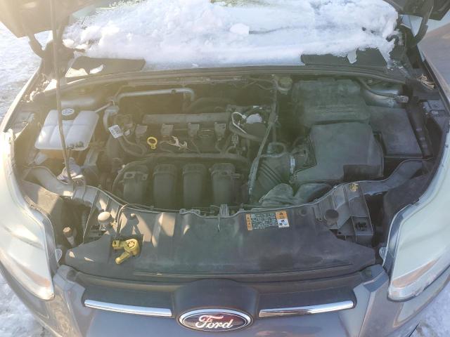 Photo 11 from auction – 2014 FORD FOCUS SE with VIN 1FADP3F2XEL356474