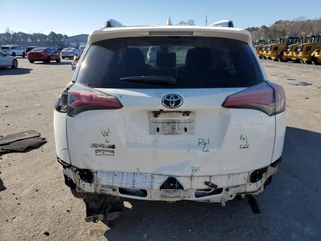 Photo 6 from auction – 2018 TOYOTA RAV4 LE with VIN JTMZFREV9JJ743539