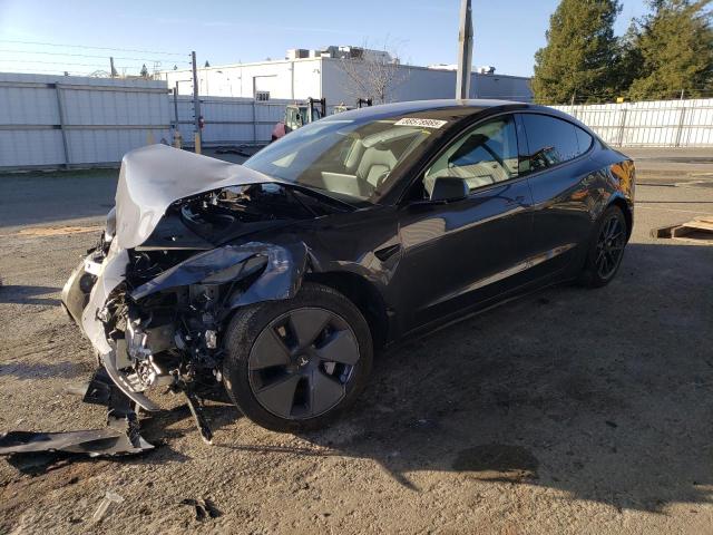 TESLA MODEL 3 2022 with VIN 5YJ3E1EB2NF296520 - Photo from auction