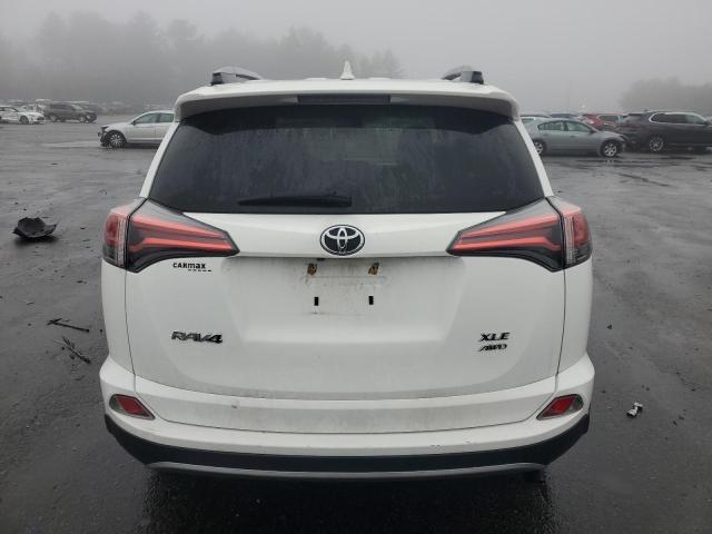 Photo 6 from auction – 2017 TOYOTA RAV4 XLE with VIN 2T3RFREV5HW683514