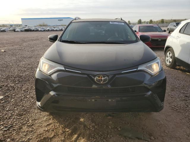 Photo 5 from auction – 2018 TOYOTA RAV4 LE with VIN 2T3ZFREV5JW517743