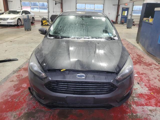 Photo 5 from auction – 2017 FORD FOCUS SE with VIN 1FADP3FE0HL275840