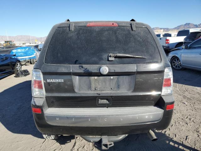Foto 6 de la subasta – 2011 MERCURY MARINER con VIN 4M2CN8B76BKJ01102