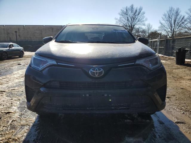 Photo 5 from auction – 2018 TOYOTA RAV4 LE with VIN 2T3BFREV5JW852440