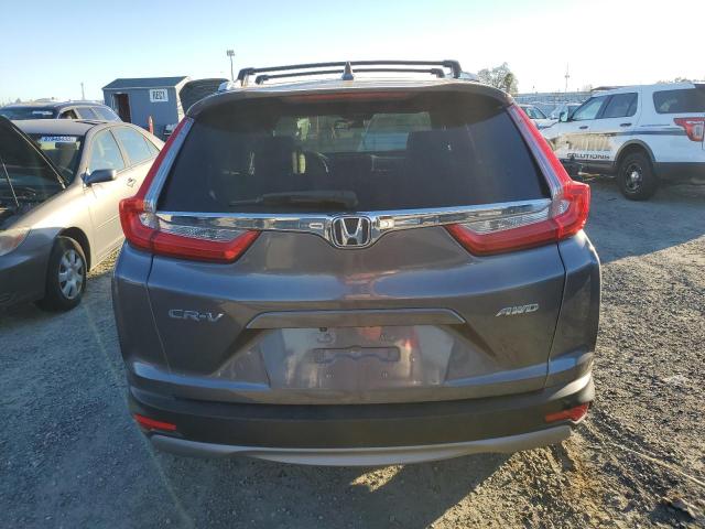 Photo 6 from auction – 2018 HONDA CR-V EX with VIN 7FARW2H52JE007458