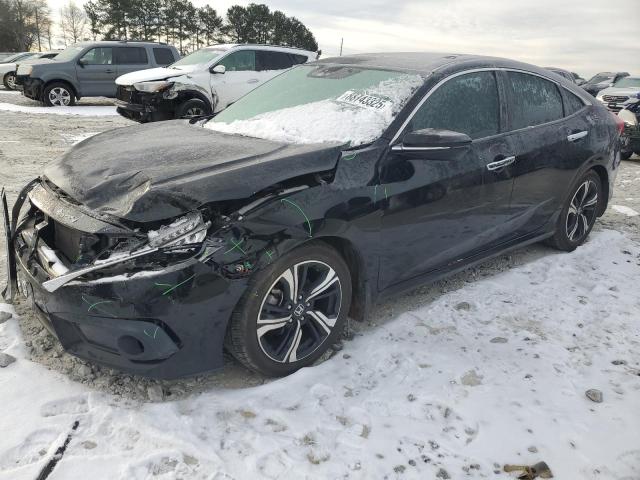 Photo 1 from auction – 2017 HONDA CIVIC TOUR with VIN 19XFC1F91HE032309